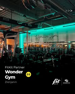 Enterijer Wonder Gym kluba sa neonskim natpisom